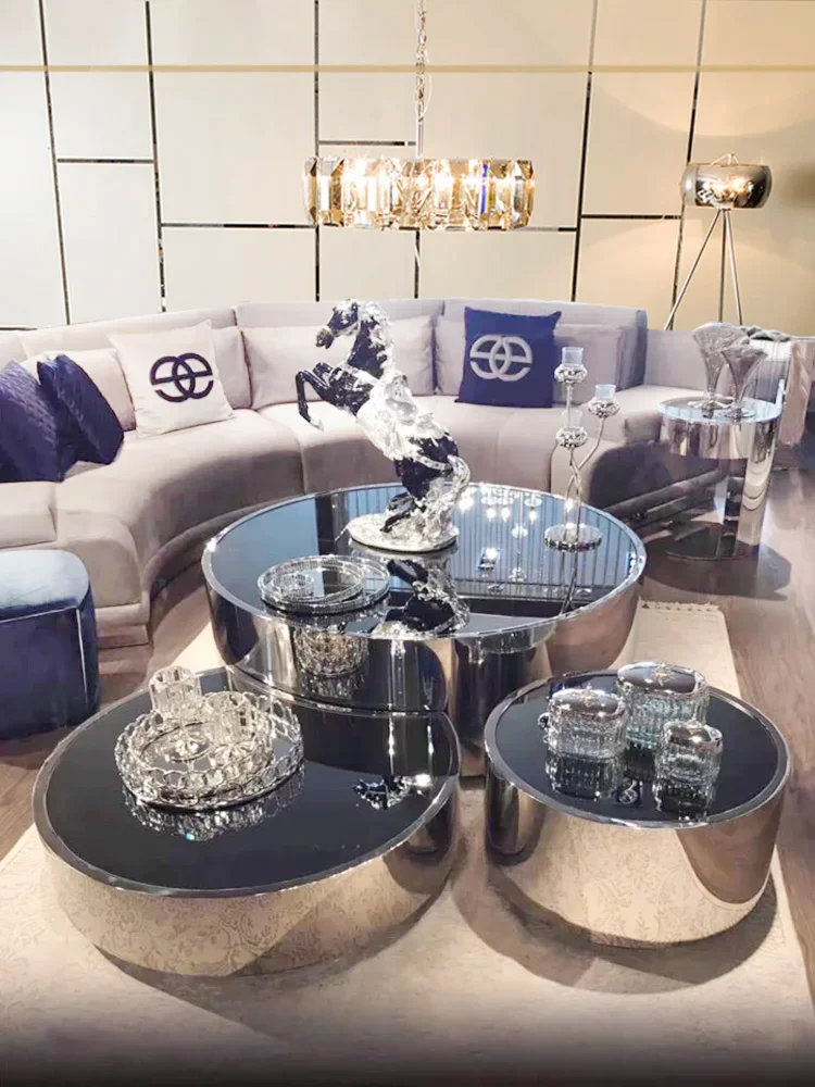 Italian minimalist stainless steel tempered glass coffee table modern simple light luxury villa high and low combination round t
Italian minimalist stainless steel tempered glass coffee table modern simple light luxury villa high and low combination round t