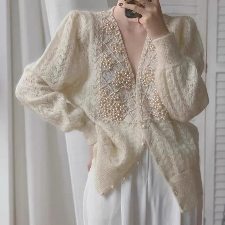 Women's Spring Season Hollow Knit Cardigan Beautiful Jacket with Pearl Decoration Top
Women's Spring Season Hollow Knit Cardigan Beautiful Jacket with Pearl Decoration Top
