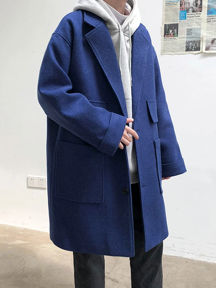 Синее шерстяное мужское пальто, весенне-осеннее свободное пальто средней длины, модная корейская ветровка, повседневная молодежная модная
Синее шерстяное мужское пальто, весенне-осеннее свободное пальто средней длины, модная корейская ветровка, повседневная молодежная модная