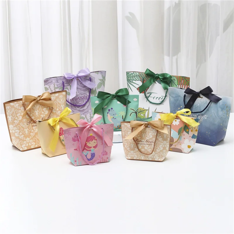 100Pcs/Lot Ribbon Bow Colorful Cardboard Paper Tote Gift Bags with Handles Shopping Party Wedding Party Birthday Retail Bags
100Pcs/Lot Ribbon Bow Colorful Cardboard Paper Tote Gift Bags with Handles Shopping Party Wedding Party Birthday Retail Bags