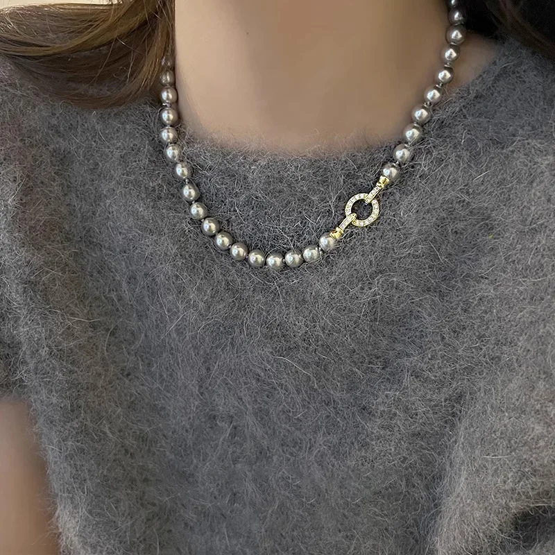 Ожерелье из серого жемчуга для женщин, серебро 925, новинка глянцевого бисера, нежная цепочка на ключицу, элегантные свадебные изысканные украшения
Ожерелье из серого жемчуга для женщин, серебро 925, новинка глянцевого бисера, нежная цепочка на ключицу, элегантные свадебные изысканные украшения