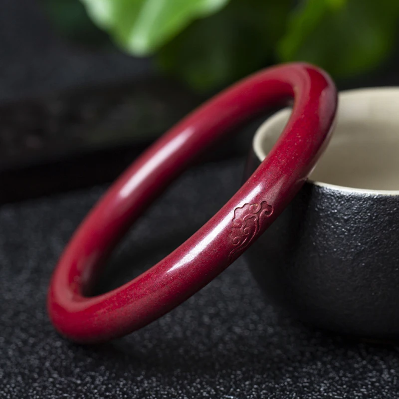 Thick round bracelet auspicious cloud pattern, made from natural ore with high content of imperial purple gold
Thick round bracelet auspicious cloud pattern, made from natural ore with high content of imperial purple gold