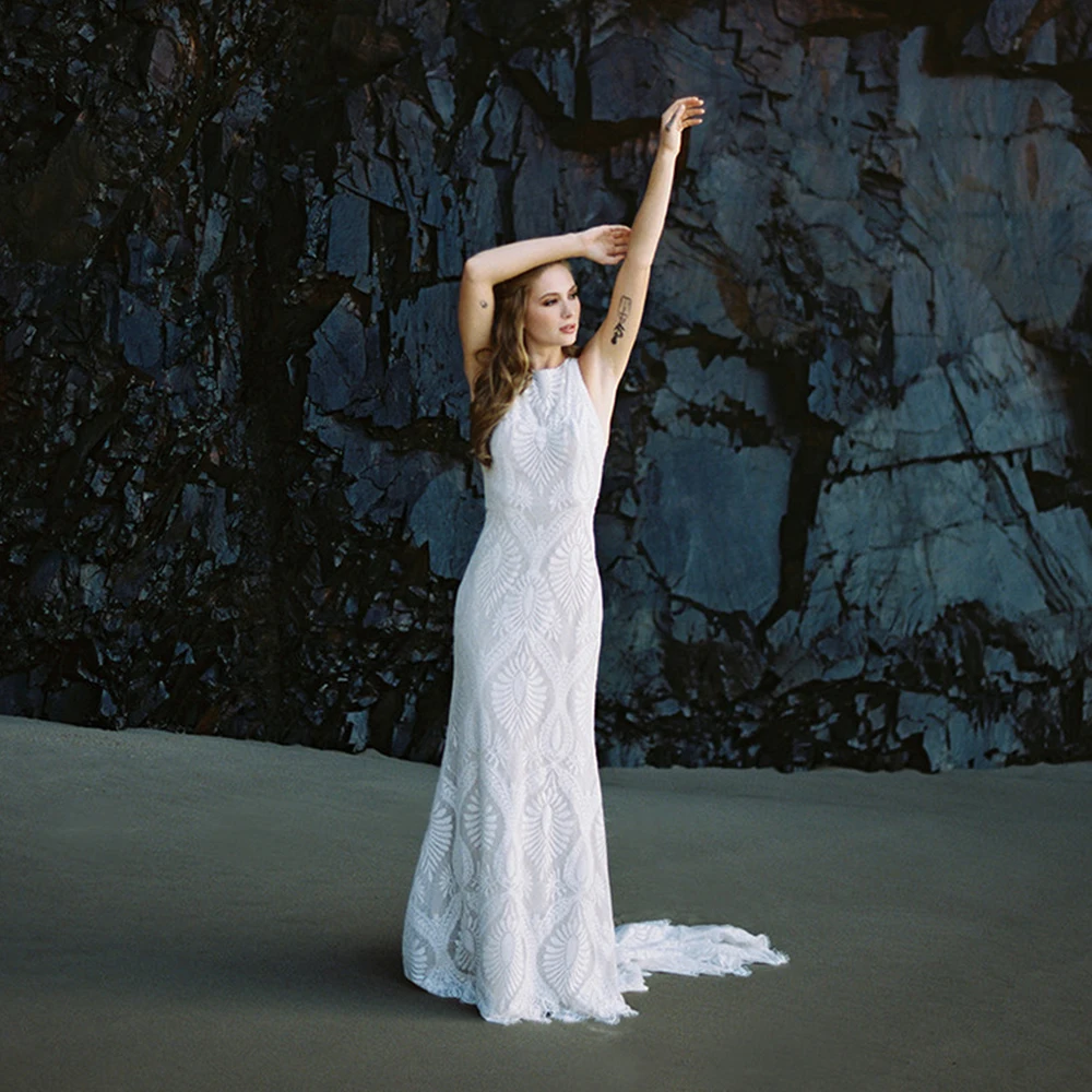 Sexy Open Back Lace Wedding Dress O-Neck Sleeveless Sheath Floor Length with Sweep Train Bridal High Quality Custom Made Gowns
Sexy Open Back Lace Wedding Dress O-Neck Sleeveless Sheath Floor Length with Sweep Train Bridal High Quality Custom Made Gowns