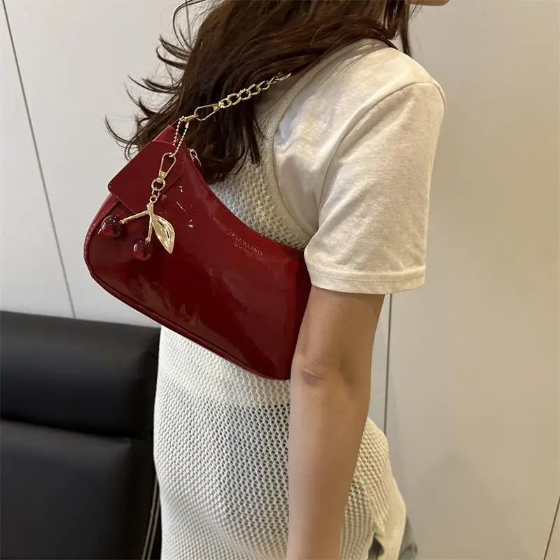 Fashion Casual Solid Color PU Leather Shoulder Bag Korean Vintage Simple Underarm Commuter Handbag With Cherry Pendant
Fashion Casual Solid Color PU Leather Shoulder Bag Korean Vintage Simple Underarm Commuter Handbag With Cherry Pendant