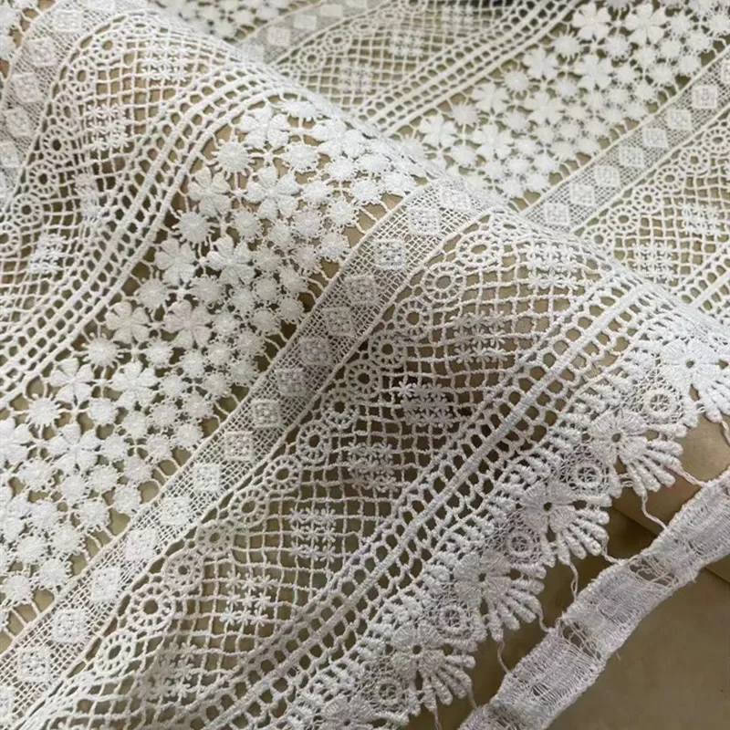 Pure Cotton White Hollow Water-Soluble Lace Fabric Vertical Stripes on a Black Background High-End Dress Lace Material
Pure Cotton White Hollow Water-Soluble Lace Fabric Vertical Stripes on a Black Background High-End Dress Lace Material