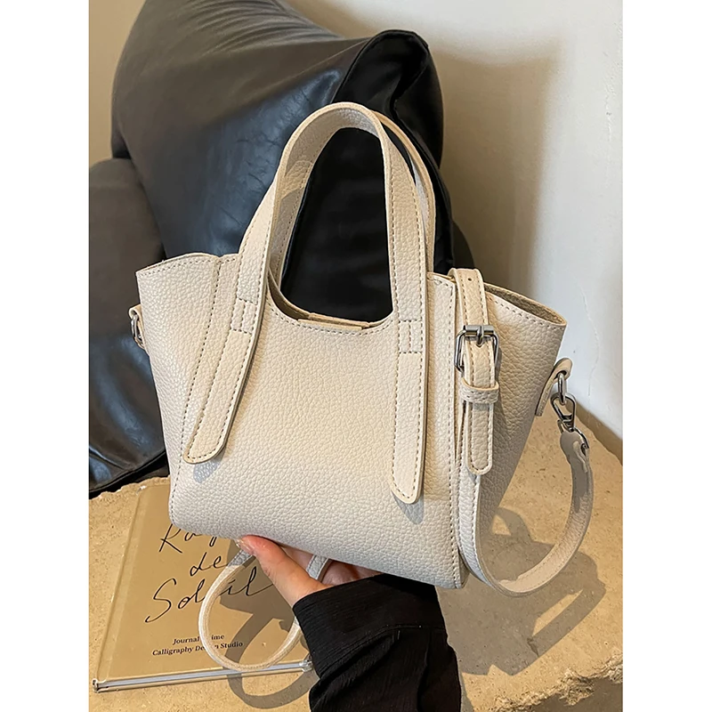 Korean Simple Litchi Leather Tote Bag Fashion Solid All-match Commute Crossbody Bag Women's Summer Casual New Shoulder Handbag
Korean Simple Litchi Leather Tote Bag Fashion Solid All-match Commute Crossbody Bag Women's Summer Casual New Shoulder Handbag