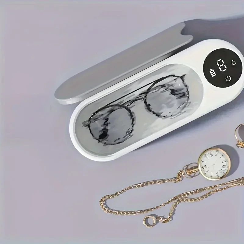 A USB glasses and jewelry cleaner, designed with USB rechargeable sonic technology for glasses and jewelry cleaning
A USB glasses and jewelry cleaner, designed with USB rechargeable sonic technology for glasses and jewelry cleaning