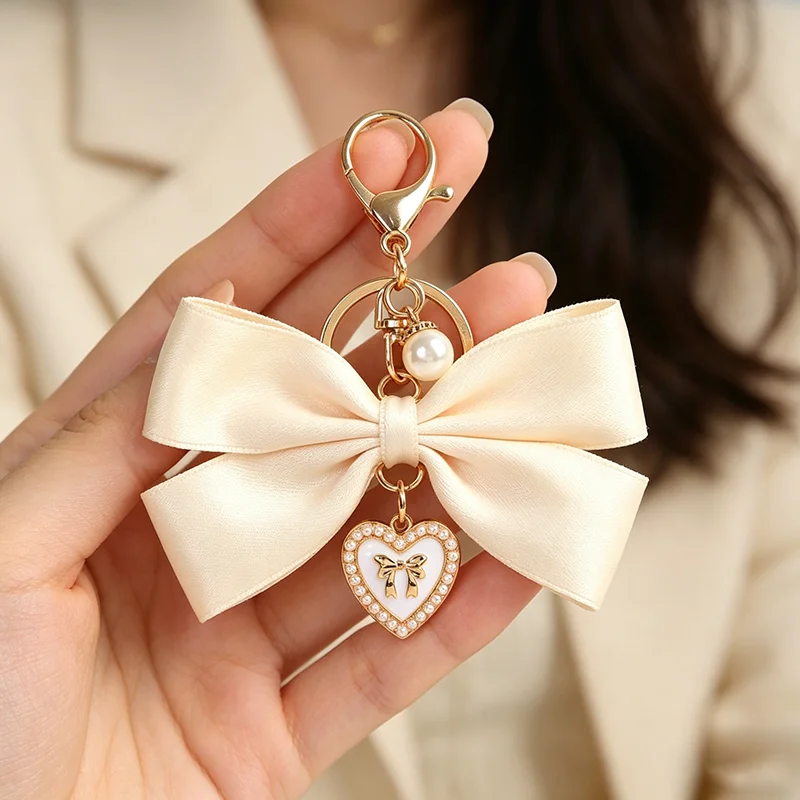 Elegant Satin Bow Keychain Pearl Heart Rhinestone Pendant Bag Charm Sweet Girls Bowknot Key Ring Purse Handbag Decor Accessory G
Elegant Satin Bow Keychain Pearl Heart Rhinestone Pendant Bag Charm Sweet Girls Bowknot Key Ring Purse Handbag Decor Accessory G