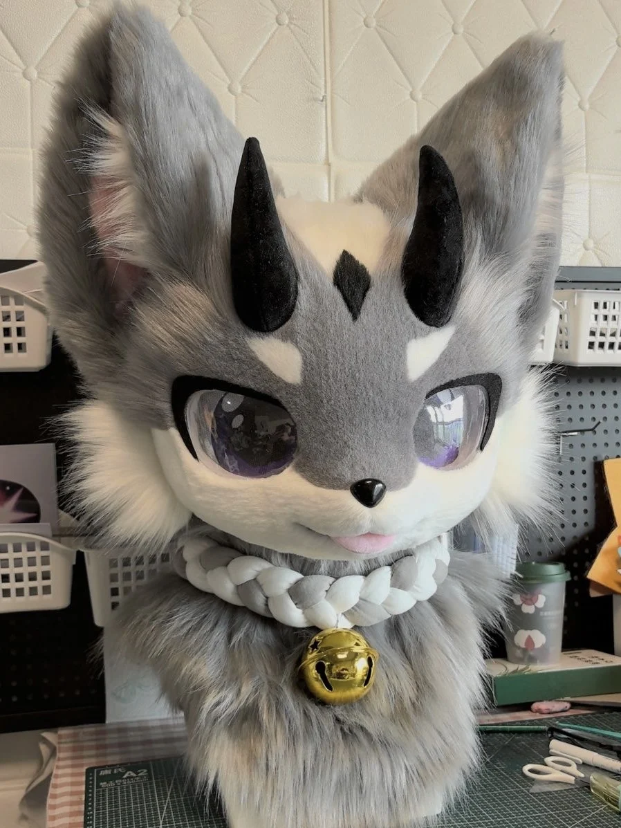 Long fur coat with Christmas fox character costume. Husky wearing cat mascot outfit. Character costume disguise
Long fur coat with Christmas fox character costume. Husky wearing cat mascot outfit. Character costume disguise