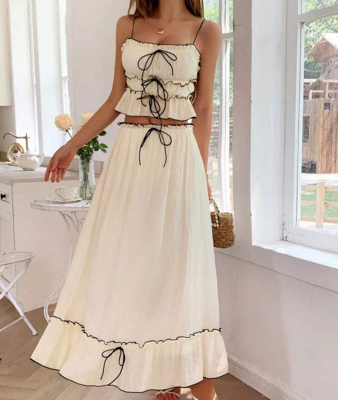 French Women's Two-Piece Set Vacation Skirt Setbow Strap Contrasting Lace Tank Tops Elegant High Waisted A-Line Long Skirt Set
French Women's Two-Piece Set Vacation Skirt Setbow Strap Contrasting Lace Tank Tops Elegant High Waisted A-Line Long Skirt Set