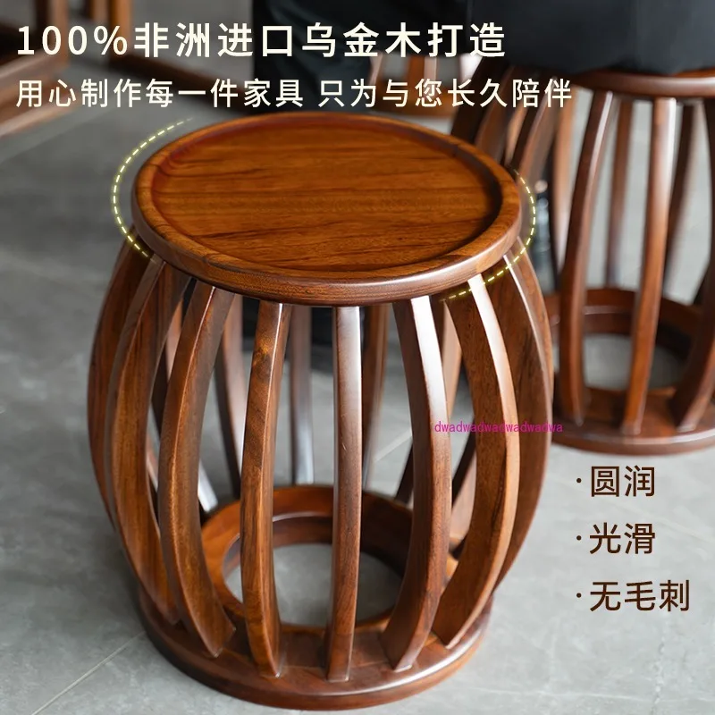 New Chinese ebony solid wood drum stool round stool short pier sitting pier household tea table stool
New Chinese ebony solid wood drum stool round stool short pier sitting pier household tea table stool