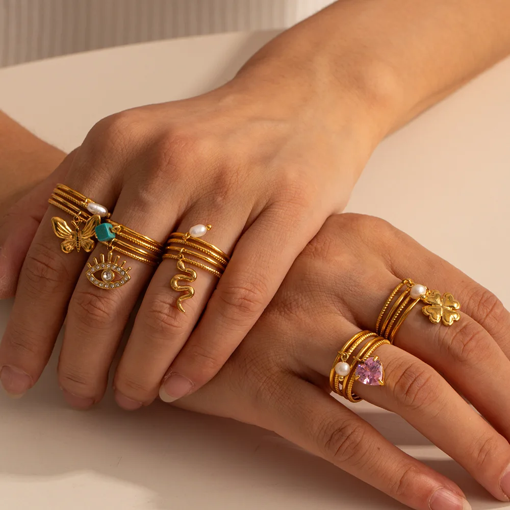 Waterproof Jewelry Women's Pearl Zircon Evil Eye Clover Snake Butterfly Heart 18K Gold Plated Stainless Steel Ring with Charms
Waterproof Jewelry Women's Pearl Zircon Evil Eye Clover Snake Butterfly Heart 18K Gold Plated Stainless Steel Ring with Charms