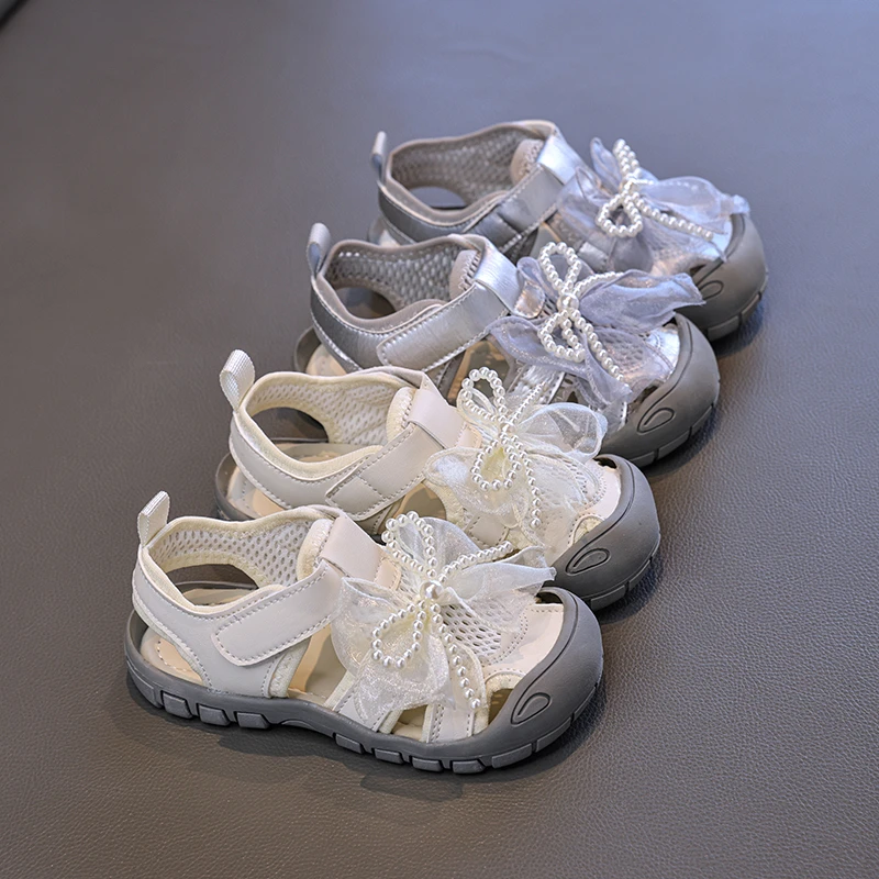 Mumoresip Children's Summer Closed Toe Sandals Pearl Bow Girls Mesh Sports Shoes Causal Breathable Kids School Running Sandals
Mumoresip Children's Summer Closed Toe Sandals Pearl Bow Girls Mesh Sports Shoes Causal Breathable Kids School Running Sandals