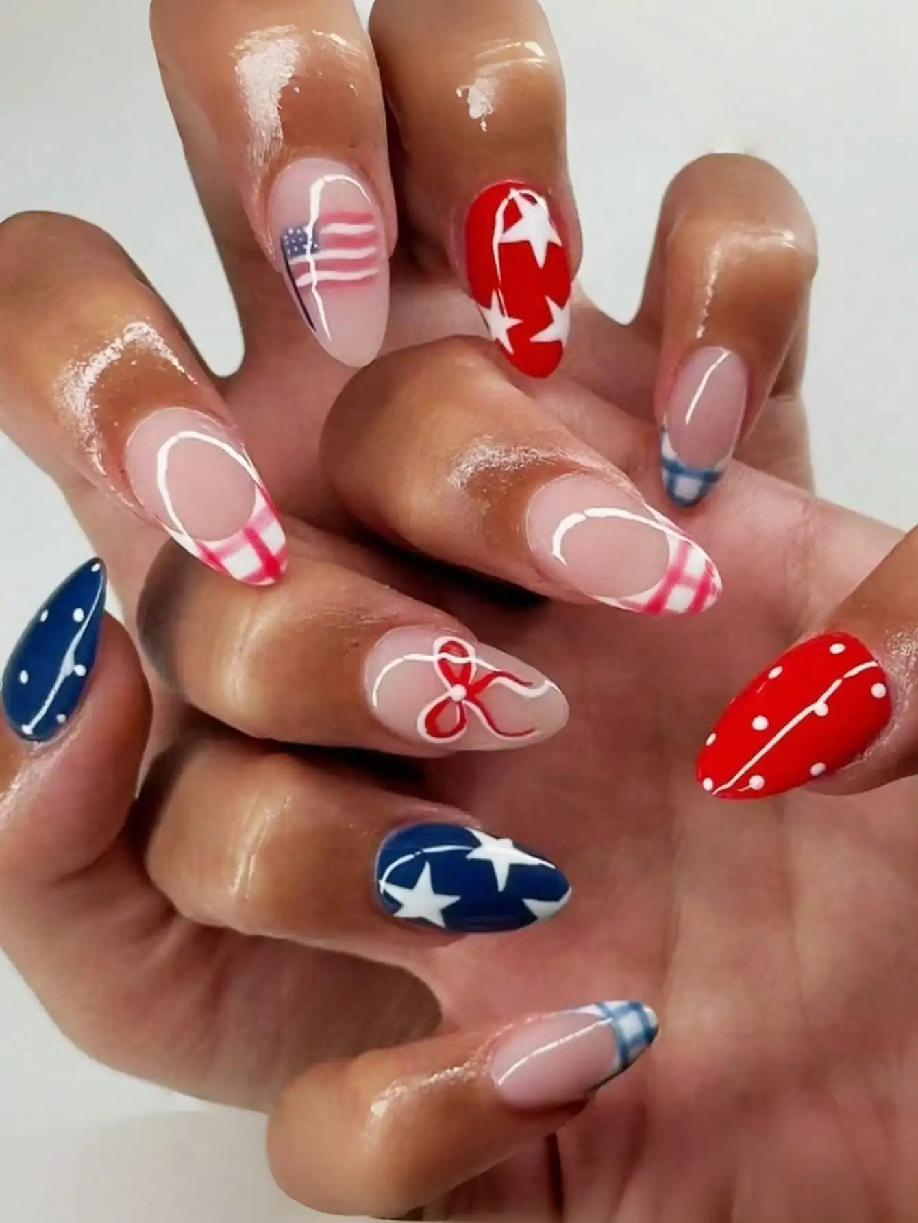 24pcs Patriotic Independence Day False Nails Set, Including Bow, Western Cowboy Star And National Flag Floral Patterns. Reusable Oval Shaped Artificial Nails, Suitable For Independence Day And Memorial Day Nail Art
24pcs Patriotic Independence Day False Nails Set, Including Bow, Western Cowboy Star And National Flag Floral Patterns. Reusable Oval Shaped Artificial Nails, Suitable For Independence Day And Memorial Day Nail Art