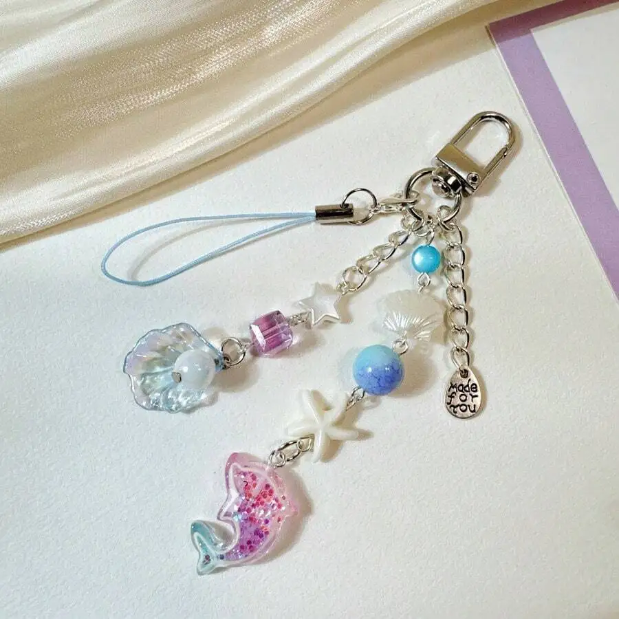 Purple Marine Creature Beaded Keychain With Shell Star Dolphin Charms For Women Bags Phones
Purple Marine Creature Beaded Keychain With Shell Star Dolphin Charms For Women Bags Phones