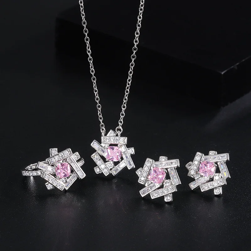 Stunning Pink Gemstone Jewelry Puzzle Pendant Necklace, Earrings, and Ring with Sparkling Accents for Women, Ideal for Weddings
Stunning Pink Gemstone Jewelry Puzzle Pendant Necklace, Earrings, and Ring with Sparkling Accents for Women, Ideal for Weddings