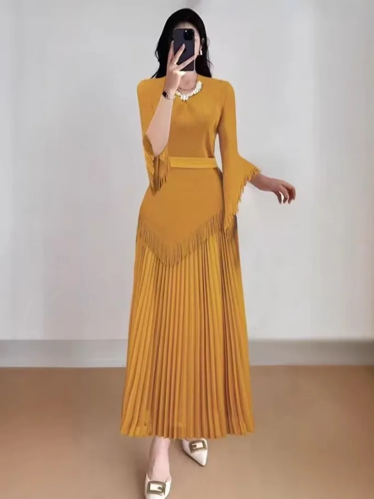 2026 Spring New African Miyake Pleated Solid Color Suit Irregular Bat Sleeve Top + Pleated Skirt Two-piece Set
2026 Spring New African Miyake Pleated Solid Color Suit Irregular Bat Sleeve Top + Pleated Skirt Two-piece Set