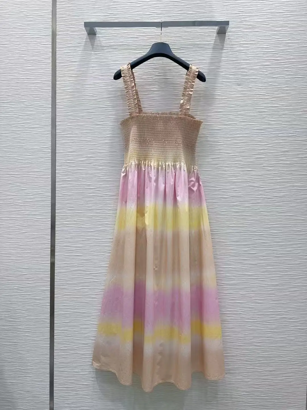 Summer vintage gradient rainbow-striped halter dress with pleated shoulder straps, cinched waist and wide skirt for beach vacati
Summer vintage gradient rainbow-striped halter dress with pleated shoulder straps, cinched waist and wide skirt for beach vacati