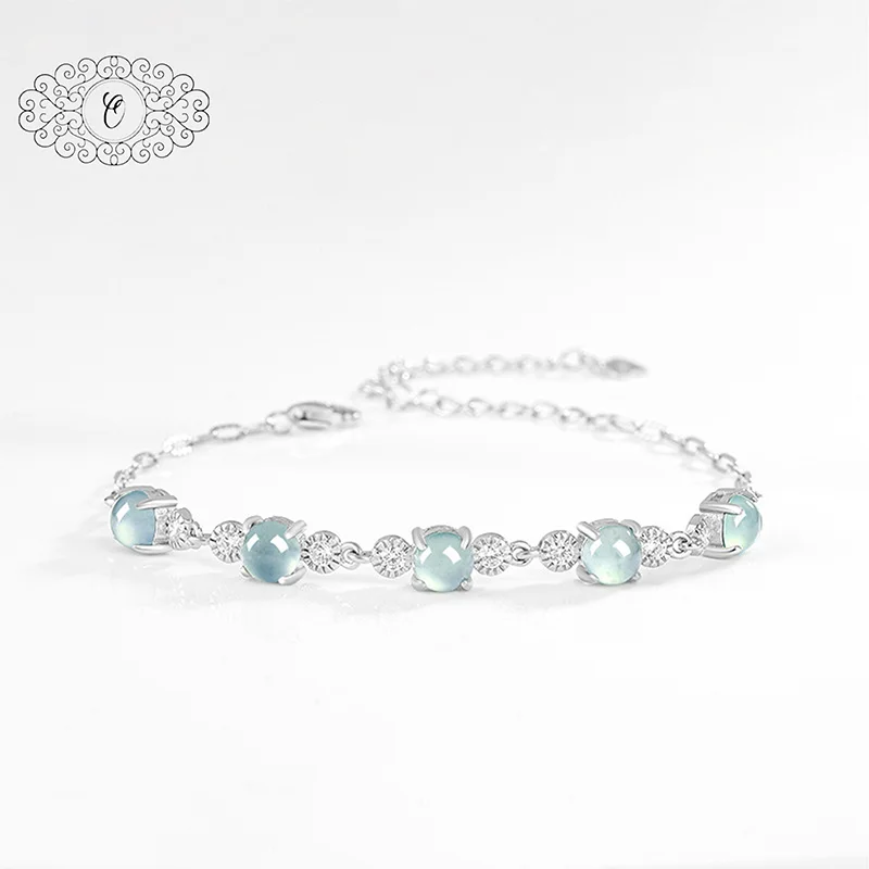 Elegant Blue Water Jadeite Cabochon Bracelet Serene Lake-Inspired Ovals on Delicate Silver Chain Minimalist Dangle Charm Design
Elegant Blue Water Jadeite Cabochon Bracelet Serene Lake-Inspired Ovals on Delicate Silver Chain Minimalist Dangle Charm Design