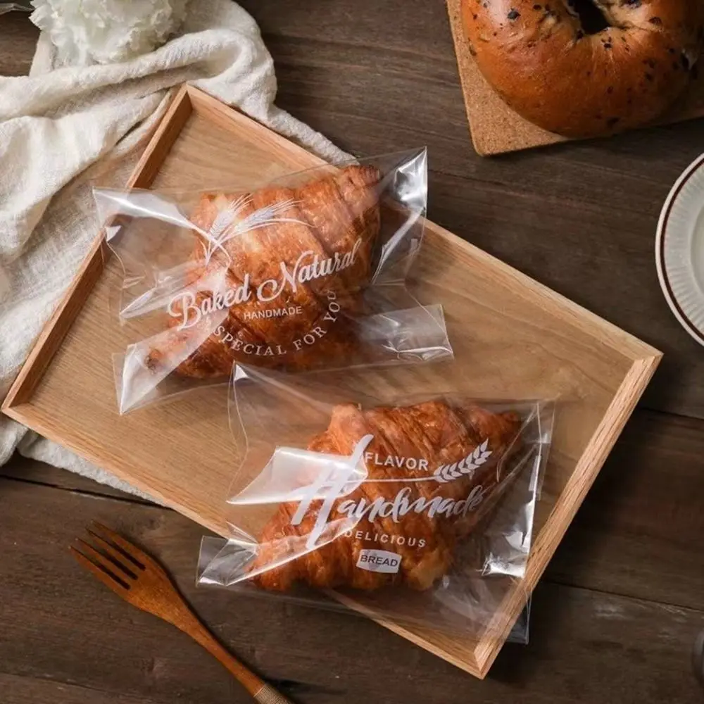 100Pcs Convenient Transparent Bread Self Sealing Bag Cartoon Sealed Toast Packaging Bags Printed Bagel Bread Bag Kitchen
100Pcs Convenient Transparent Bread Self Sealing Bag Cartoon Sealed Toast Packaging Bags Printed Bagel Bread Bag Kitchen
