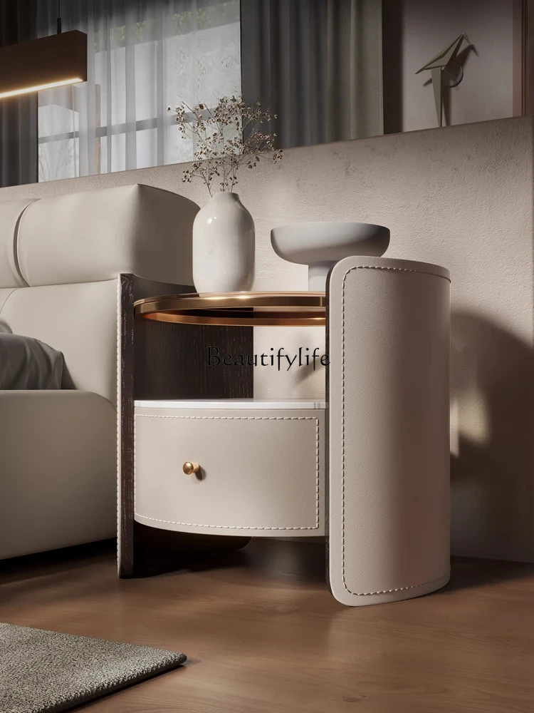 Italian minimalist saddle leather bedside table small apartment bedroom high-end storage cabinet high-end sense
Italian minimalist saddle leather bedside table small apartment bedroom high-end storage cabinet high-end sense