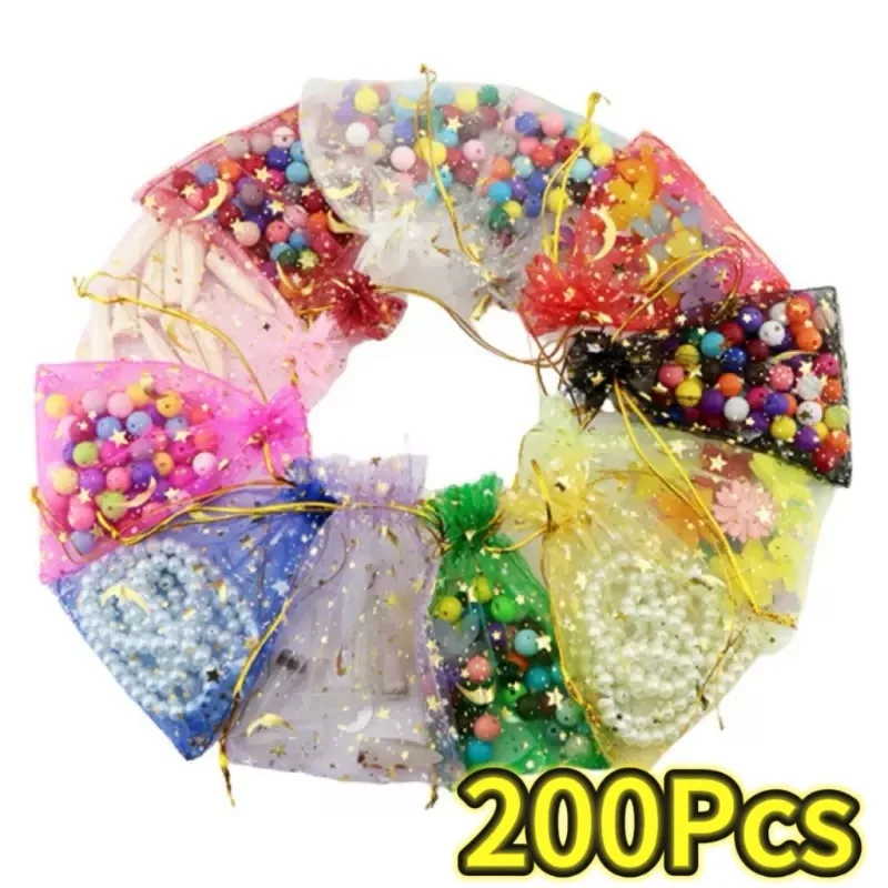 50/100/200 шт., сумки для ювелирных изделий из органзы с луной и звездами, свадебная вечеринка, рождественские конфеты, золотой цвет, упаковочные мешочки на шнурке, оптовая продажа
50/100/200 шт., сумки для ювелирных изделий из органзы с луной и звездами, свадебная вечеринка, рождественские конфеты, золотой цвет, упаковочные мешочки на шнурке, оптовая продажа