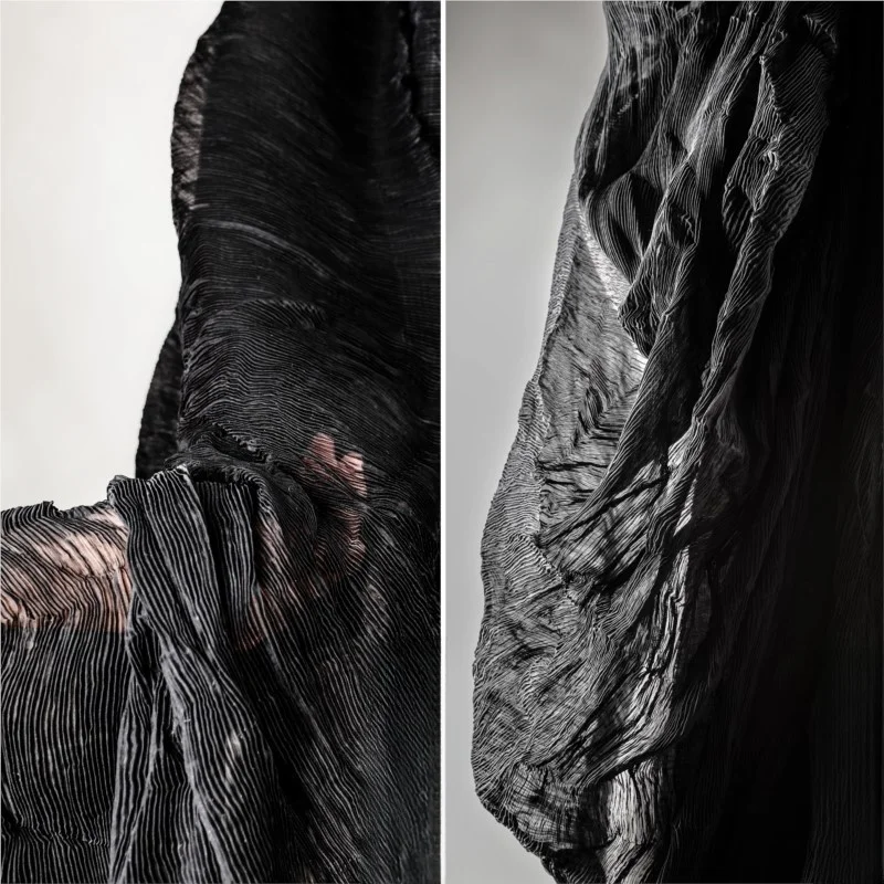 The new thin black pleated vintage translucent stretch coat dress is made of designer fabric
The new thin black pleated vintage translucent stretch coat dress is made of designer fabric
