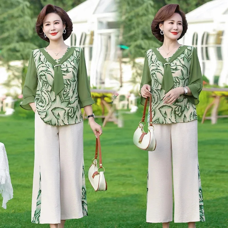 Lady Large Size 5XL Suit Middle-aged Mom Seven Divide Sleeve Trousers 2PCS Summer Femme Chiffon Top Wide Leg Pants Two-piece Set
Lady Large Size 5XL Suit Middle-aged Mom Seven Divide Sleeve Trousers 2PCS Summer Femme Chiffon Top Wide Leg Pants Two-piece Set