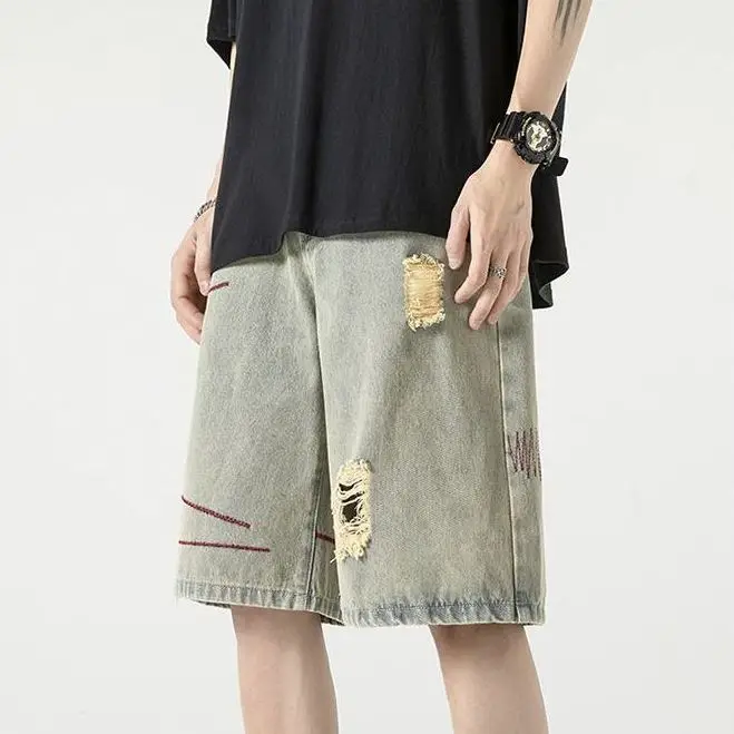 New Men's Spliced button Zipper Pockets Fashionable Loose Straight and Versatile Five-point Ripped Denim Shorts
New Men's Spliced button Zipper Pockets Fashionable Loose Straight and Versatile Five-point Ripped Denim Shorts