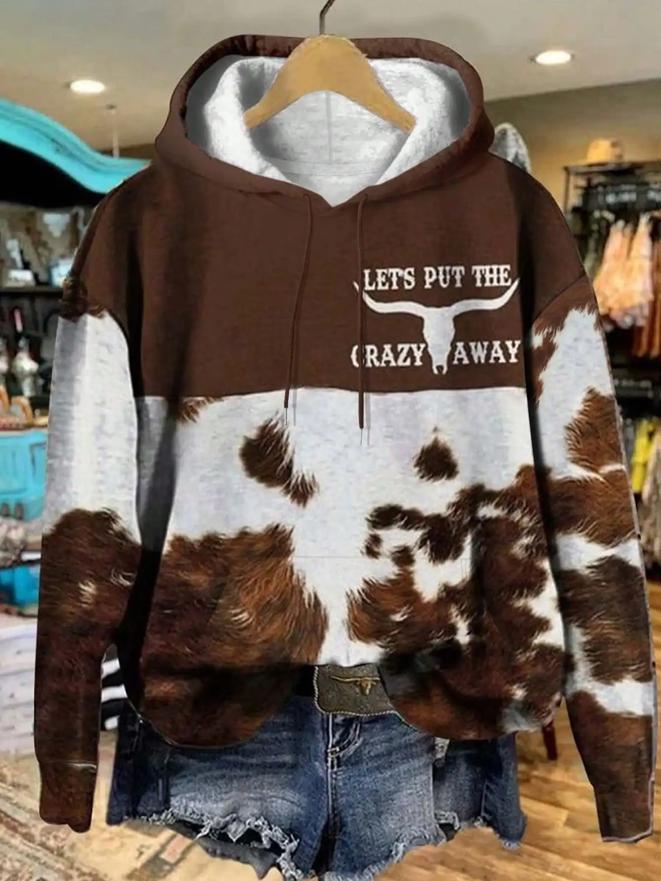 Brown & White Cow Print Hoodie with Longhorn Graphic, Loose Fit, Warm Fleece Lining for Fall Winter
Brown & White Cow Print Hoodie with Longhorn Graphic, Loose Fit, Warm Fleece Lining for Fall Winter