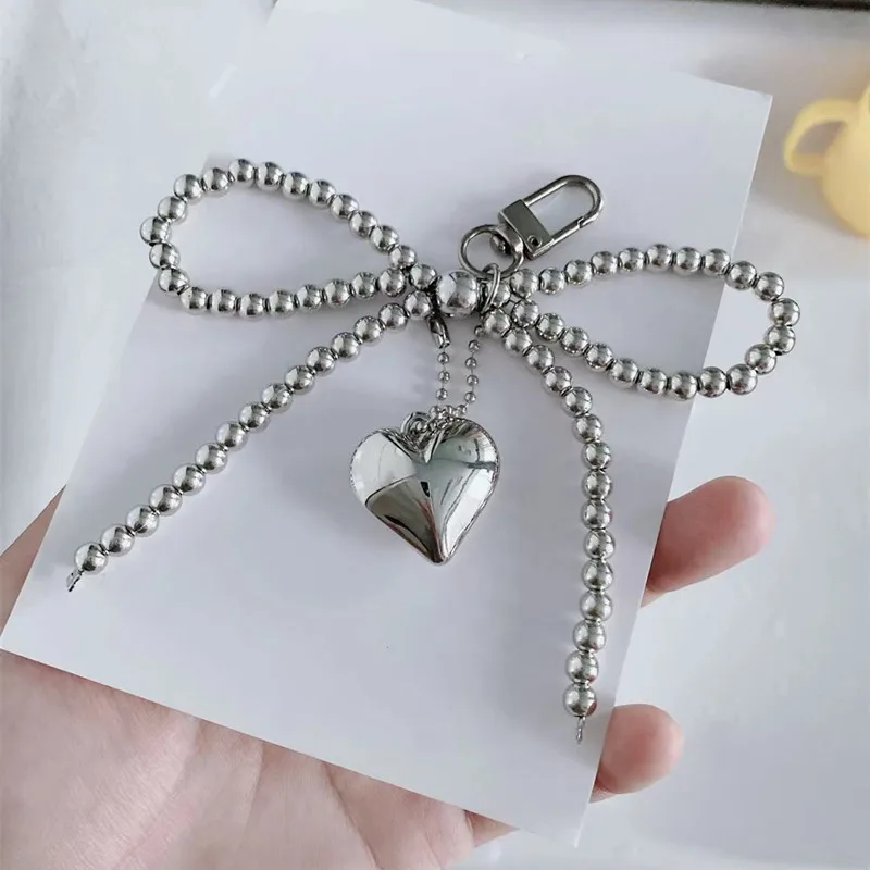 2025 cute bow imitation pearl bag pendant gift sweet girl temperament girl heart mobile phone chain love pendant
2025 cute bow imitation pearl bag pendant gift sweet girl temperament girl heart mobile phone chain love pendant