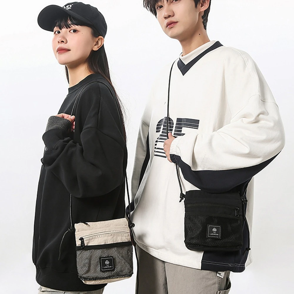 Versatile Multifunctional Crossbody Phone Pouch Mesh Korean Style Nylon Shoulder Bag Solid Color Sports Small Square Bag Unisex
Versatile Multifunctional Crossbody Phone Pouch Mesh Korean Style Nylon Shoulder Bag Solid Color Sports Small Square Bag Unisex