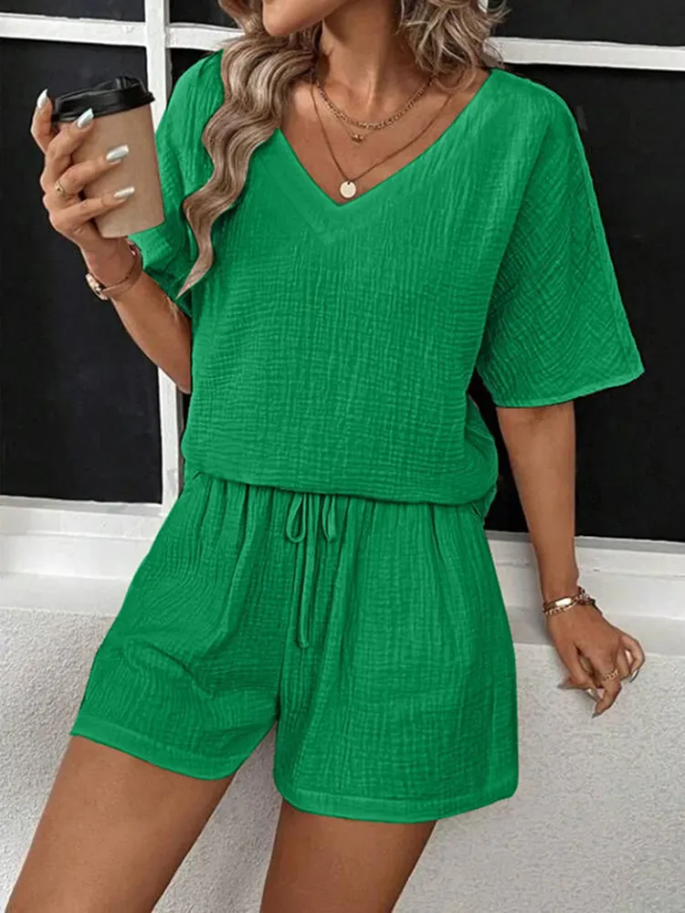 BKLD 2025 Women Clothing Summer New Casual Loose Two Piece Sets Solid Color V-Neck Half Sleeve Top And Shorts Sets Outfits
BKLD 2025 Women Clothing Summer New Casual Loose Two Piece Sets Solid Color V-Neck Half Sleeve Top And Shorts Sets Outfits