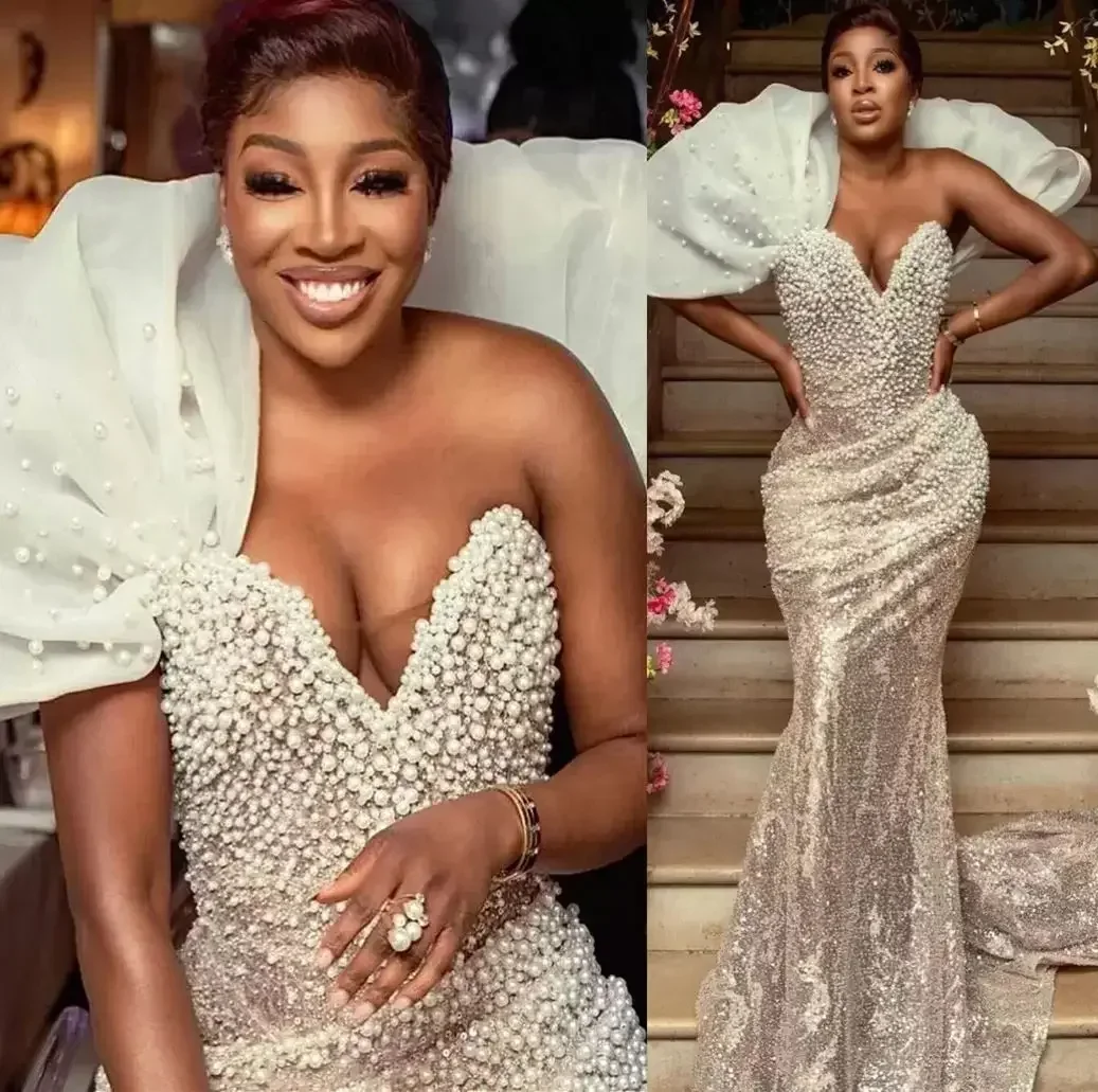 Customized Shinny Sweetheart Heavy Pearls Mermaid Vestidos De Novia Bridal Gowns African Vintage Style Wedding Dresses 2025
Customized Shinny Sweetheart Heavy Pearls Mermaid Vestidos De Novia Bridal Gowns African Vintage Style Wedding Dresses 2025