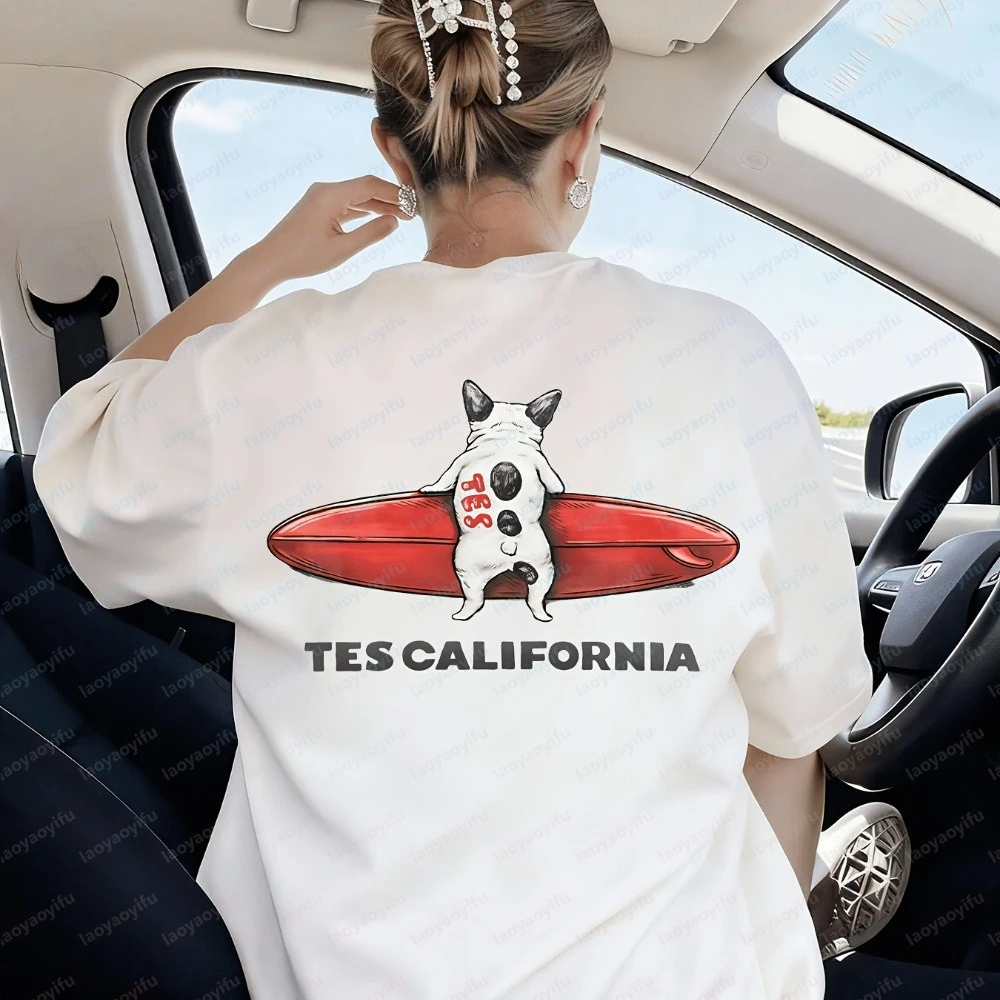 The Cartoon French Bulldog Lying on A Red Surfboard Is with The Text TES CALIFORNIA The California Surfing Style Cotton T-shirt
The Cartoon French Bulldog Lying on A Red Surfboard Is with The Text TES CALIFORNIA The California Surfing Style Cotton T-shirt
