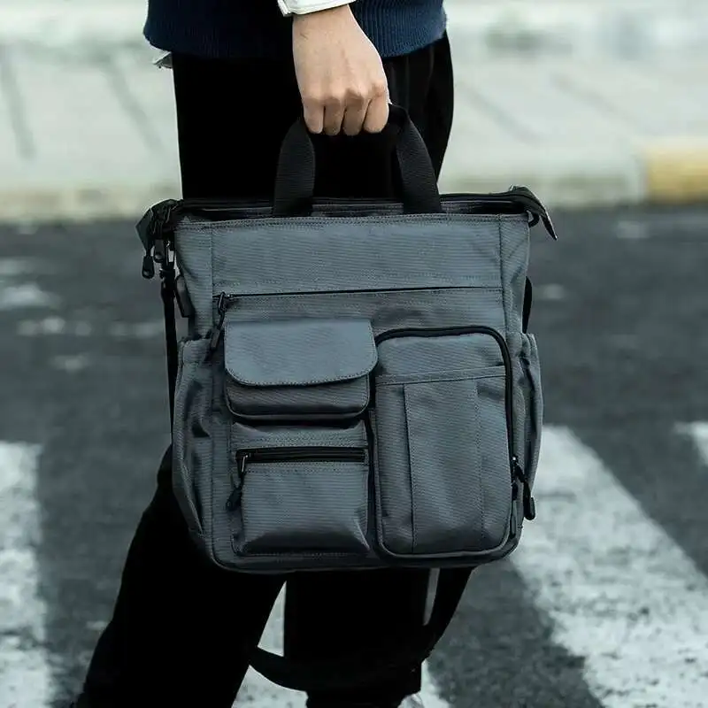 Trendy Business Men Shoulder Messenger Bag Multi-Functional Carrng Backpack Casual Commuter Hand-Carrng Bag Computer Bag
Trendy Business Men Shoulder Messenger Bag Multi-Functional Carrng Backpack Casual Commuter Hand-Carrng Bag Computer Bag