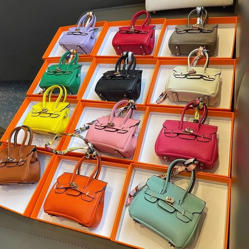 Mini bag pendant platinum bag headphones chartered car keychain creative coin purse hanging accessories versatile bag
Mini bag pendant platinum bag headphones chartered car keychain creative coin purse hanging accessories versatile bag