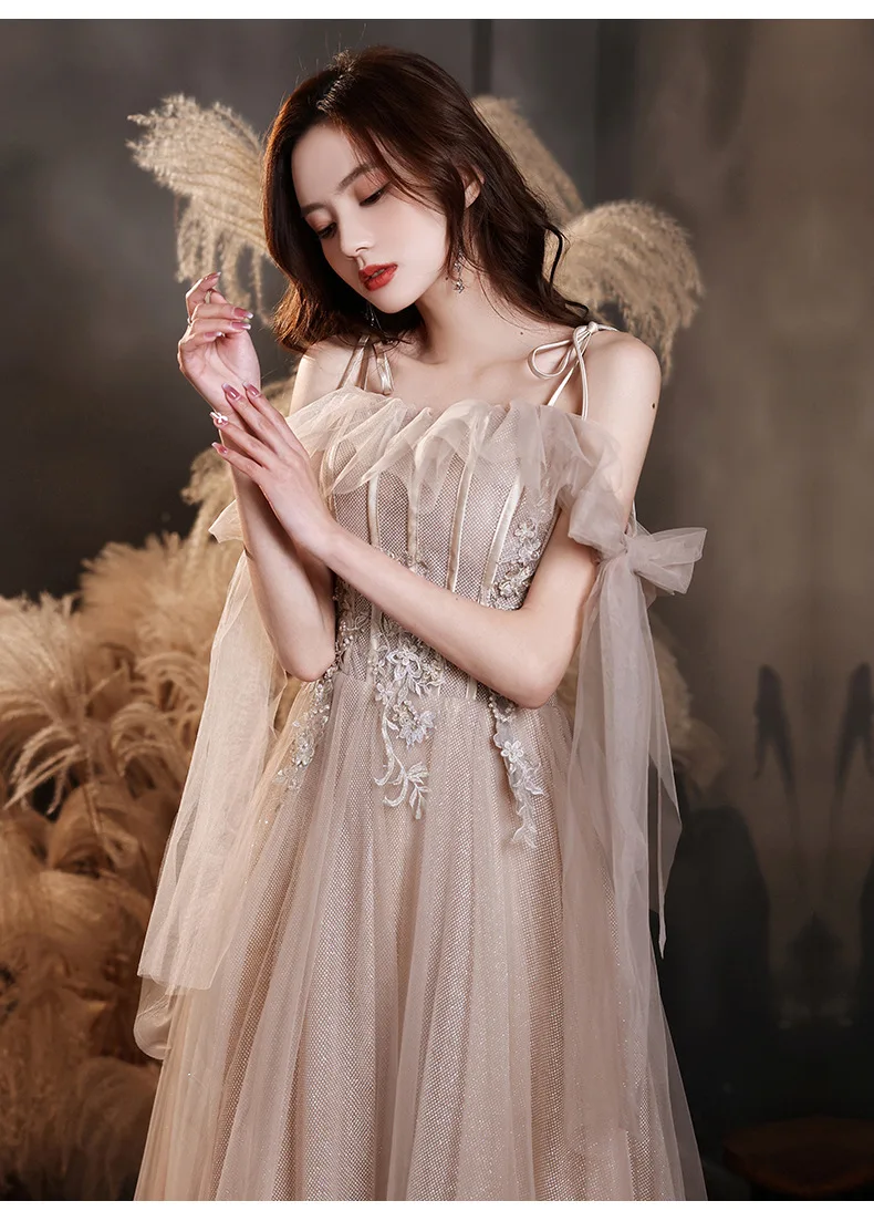 Champagne Pink Evening Gown Women Spaghetti Strap Applique Tulle Cocktail Dress Elegant Classic Bow Flutter Prom Dresses
Champagne Pink Evening Gown Women Spaghetti Strap Applique Tulle Cocktail Dress Elegant Classic Bow Flutter Prom Dresses