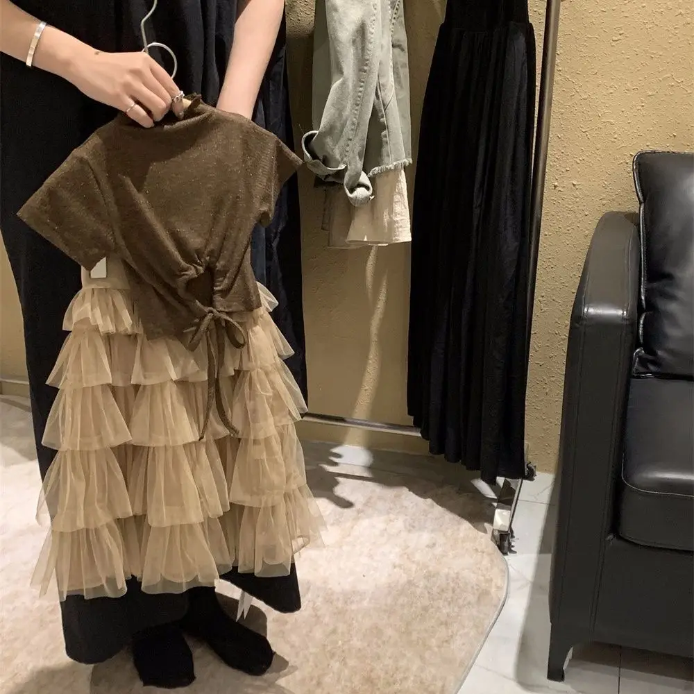 2025 summer new backless T-shirt Korean girls' cake skirt yarn skirt niche Instagram style set for two-piece set
2025 summer new backless T-shirt Korean girls' cake skirt yarn skirt niche Instagram style set for two-piece set