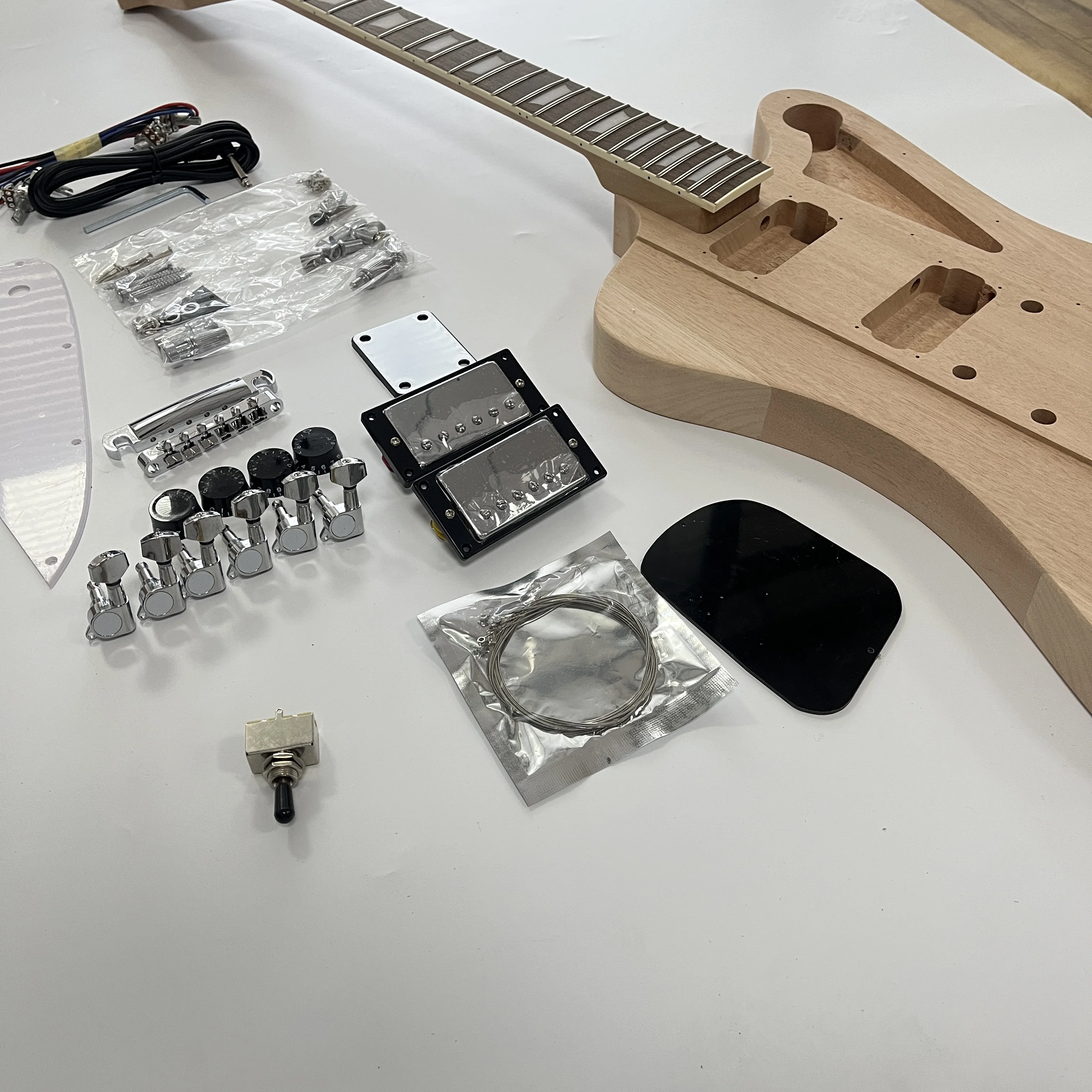 Brand-new DIY Electric Guitar Set (Six String) Rosewood Fingerboard, Mahogany Body, Rosewood Pegs. Electric guitar-themed gift. Free shipping.
Brand-new DIY Electric Guitar Set (Six String) Rosewood Fingerboard, Mahogany Body, Rosewood Pegs. Electric guitar-themed gift. Free shipping.