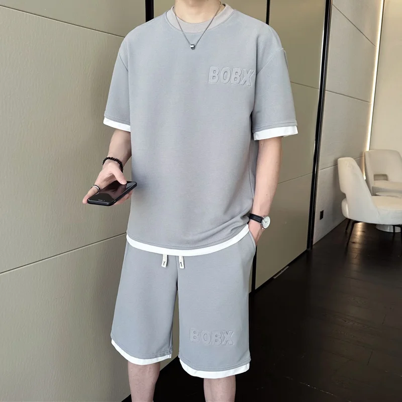 2025 New Men's Summer Ice Silk Loose ort Sve Sportswear Set Casual Two-Piece Suit Polyester Fiber T-irt And orts
2025 New Men's Summer Ice Silk Loose ort Sve Sportswear Set Casual Two-Piece Suit Polyester Fiber T-irt And orts