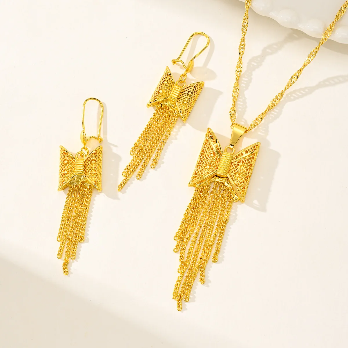 9999 gold flower tassel long necklace earrings set of two pieces of jewelry
9999 gold flower tassel long necklace earrings set of two pieces of jewelry