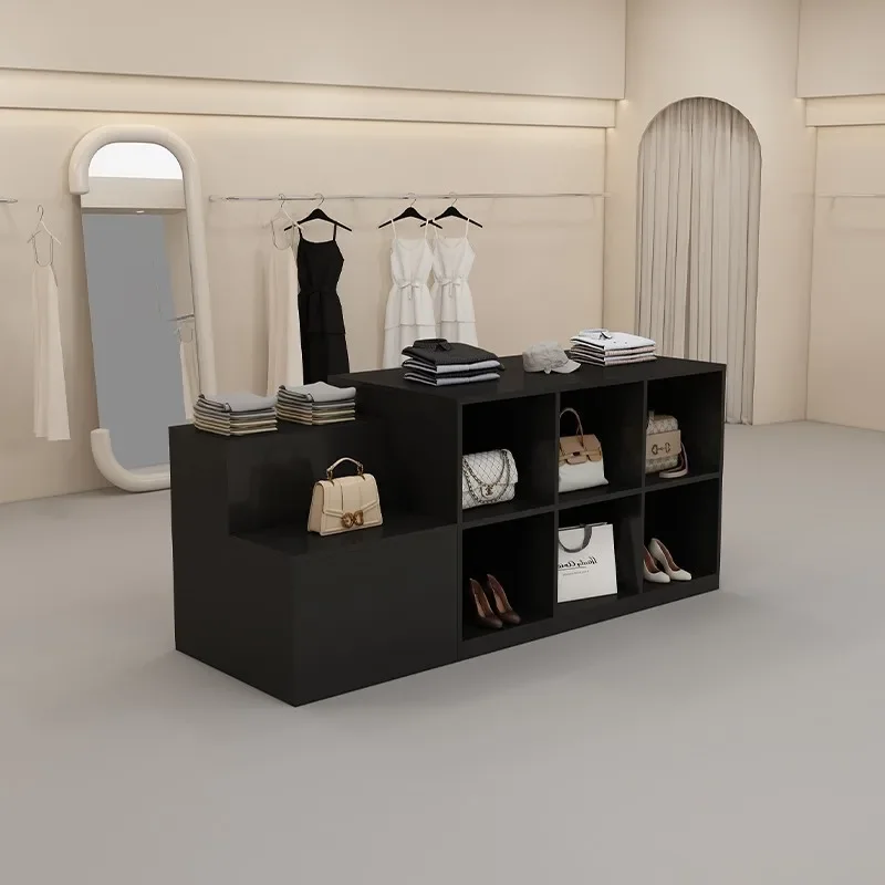 Island table in the clothing store, women's clothing store, with a flow table in the middle
Island table in the clothing store, women's clothing store, with a flow table in the middle