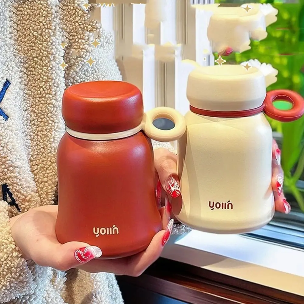Stainless Steel Mini Thermos Cup with Handle Insulated Portable Vacuum Flask Drinking Kettle Keeps Cold and Heat
Stainless Steel Mini Thermos Cup with Handle Insulated Portable Vacuum Flask Drinking Kettle Keeps Cold and Heat