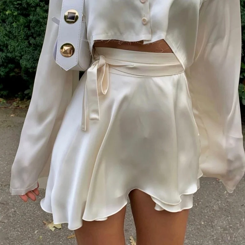 2022 Casual Black White Sexy Satin Skirts Womens Ruffles Bandage High Waist Summer Beach Skirt Ladies Bodycon Mini Skirt Female
2022 Casual Black White Sexy Satin Skirts Womens Ruffles Bandage High Waist Summer Beach Skirt Ladies Bodycon Mini Skirt Female