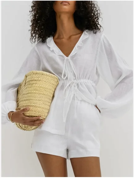 Women's Sweet Suits Comfortable Wind Sexy Slightly Transparent White V-Neck Waist Strap Top Shorts Cotton Hemp Ruffle Edge Set
Women's Sweet Suits Comfortable Wind Sexy Slightly Transparent White V-Neck Waist Strap Top Shorts Cotton Hemp Ruffle Edge Set