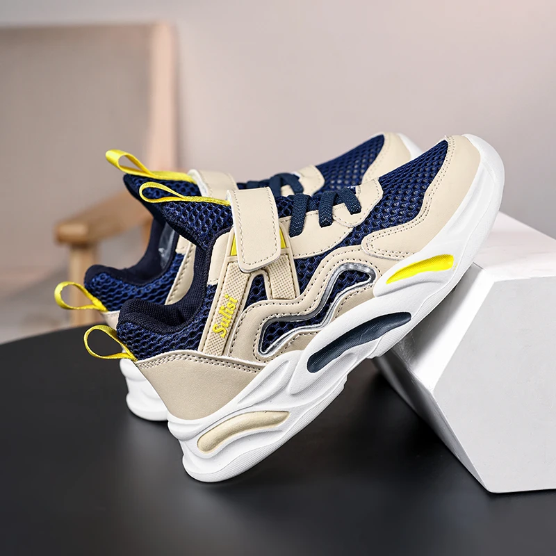 A pair of breathable summer-spring style basketball shoes suitable for children, providing comfort and durability. JT-3470
A pair of breathable summer-spring style basketball shoes suitable for children, providing comfort and durability. JT-3470