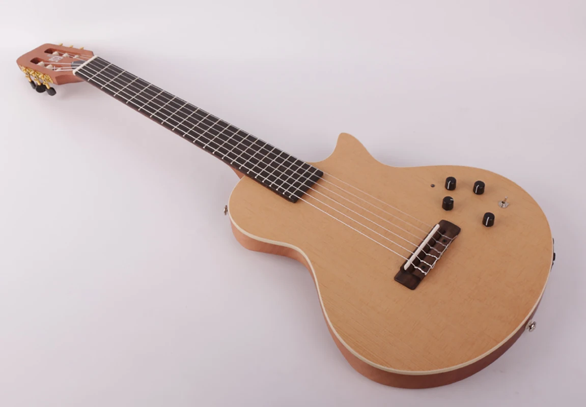 Электрическая классическая гитара, бесшумная нейлоновая струна, портативная, со встроенным эффектом
Электрическая классическая гитара, бесшумная нейлоновая струна, портативная, со встроенным эффектом