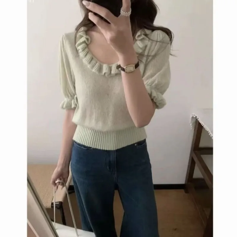 Korean Sweet Style Fungus Edge Short-sleeved Knitted Sweater Women's Spring and Summer Fashionable Versatile Small Top
Korean Sweet Style Fungus Edge Short-sleeved Knitted Sweater Women's Spring and Summer Fashionable Versatile Small Top