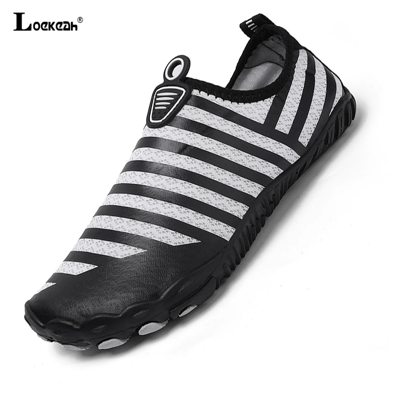 Lightweight Slip-on Aqua Shoes Men Women Quick Drying Beach Wading Sneakers Breathable Non-slip Water Footwear Size 35-46
Lightweight Slip-on Aqua Shoes Men Women Quick Drying Beach Wading Sneakers Breathable Non-slip Water Footwear Size 35-46